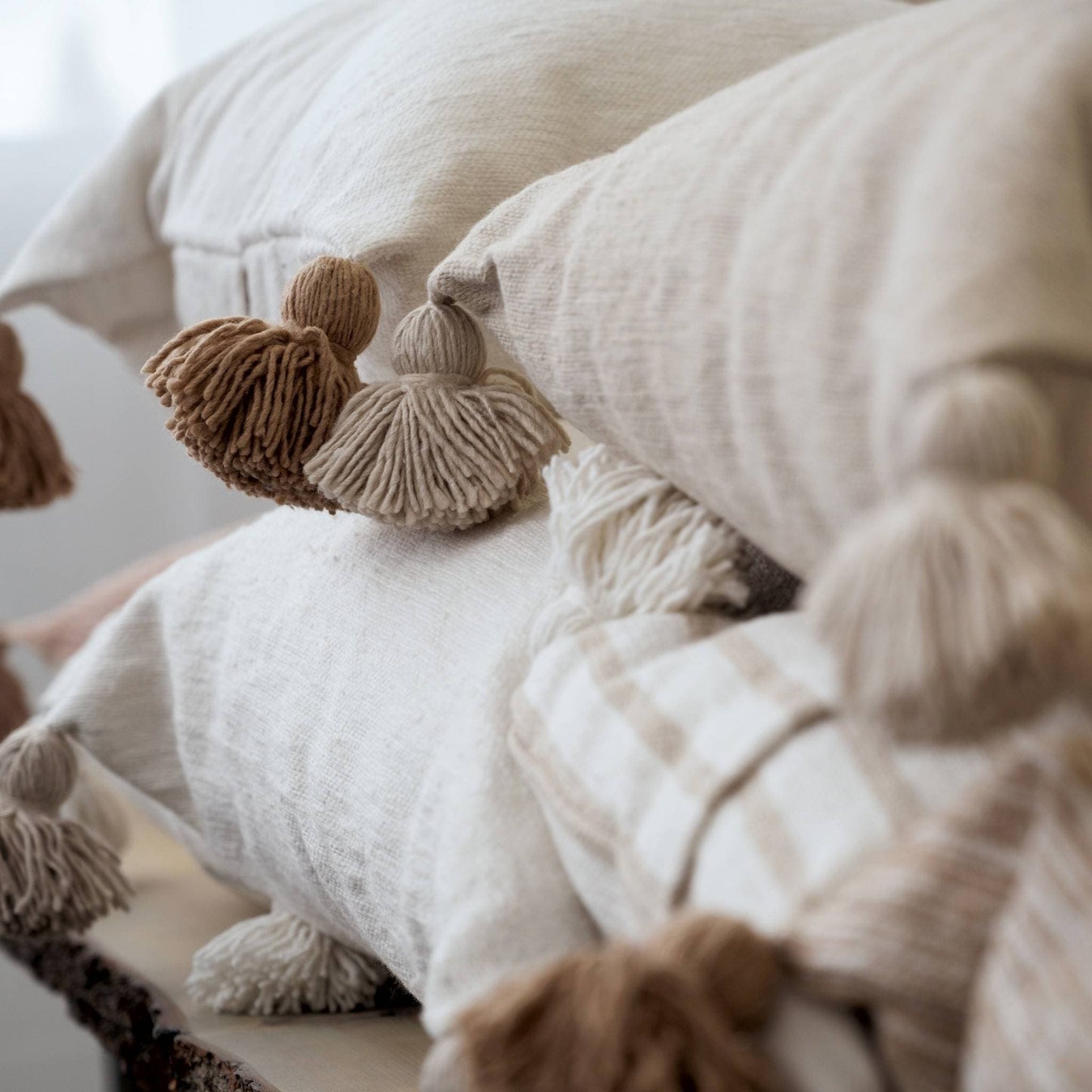 POKOLOKO Solid Moroccan Pom Pom Pillow - 18x18 #color_beige-solid-pom-pillow