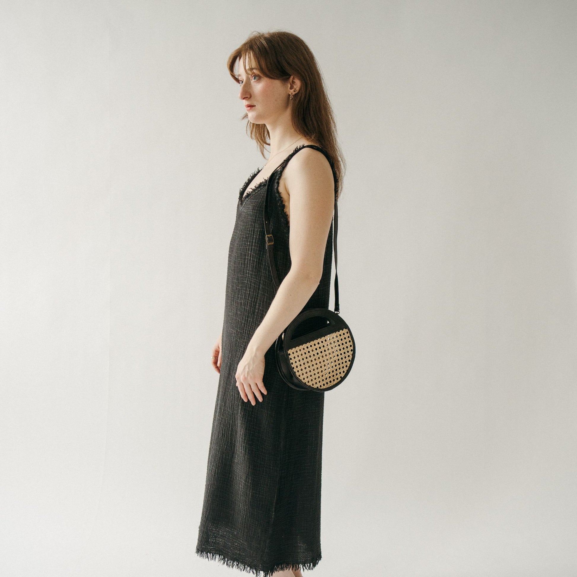 POKOLOKO Round Leather Bag with Cane Accent #color_black