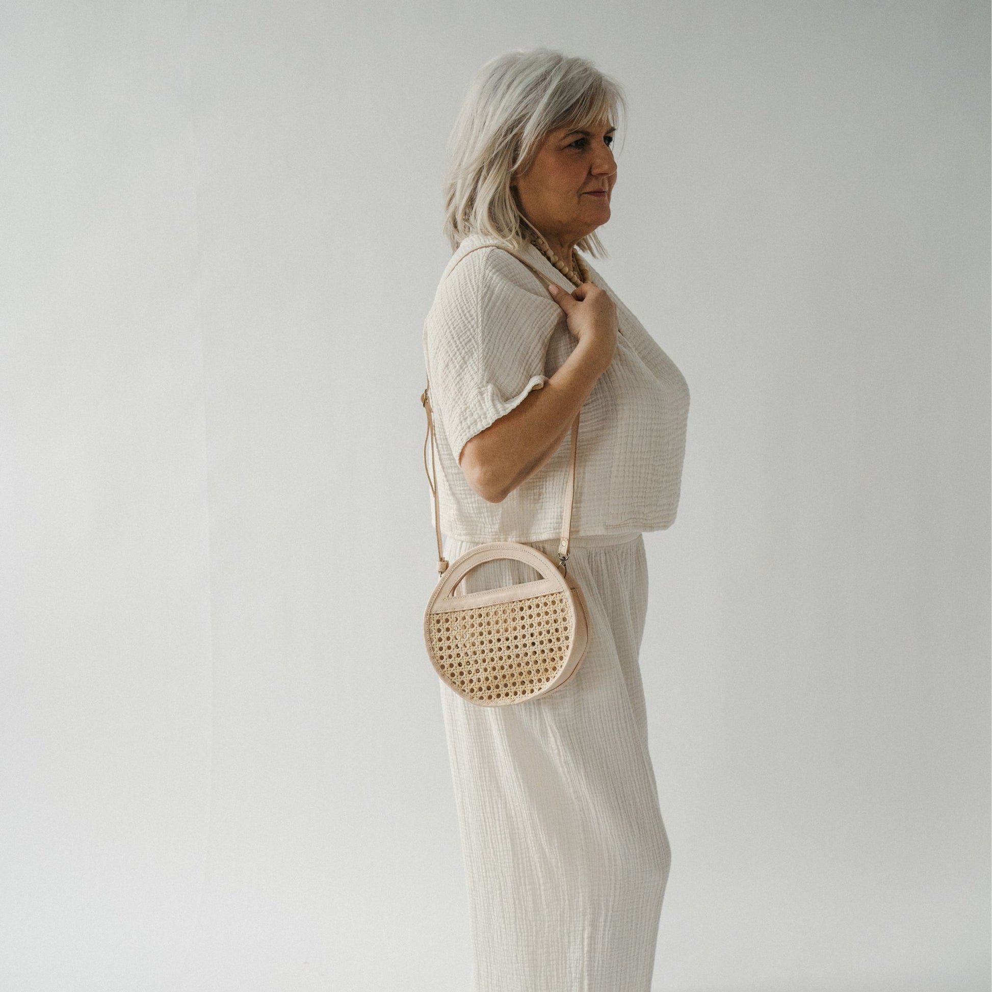 POKOLOKO Round Leather Bag with Cane Accent #color_cream
