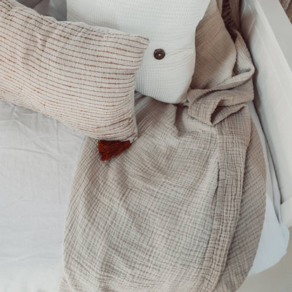 POKOLOKO Solid Crinkle Throw #color_fawn-pale-beige