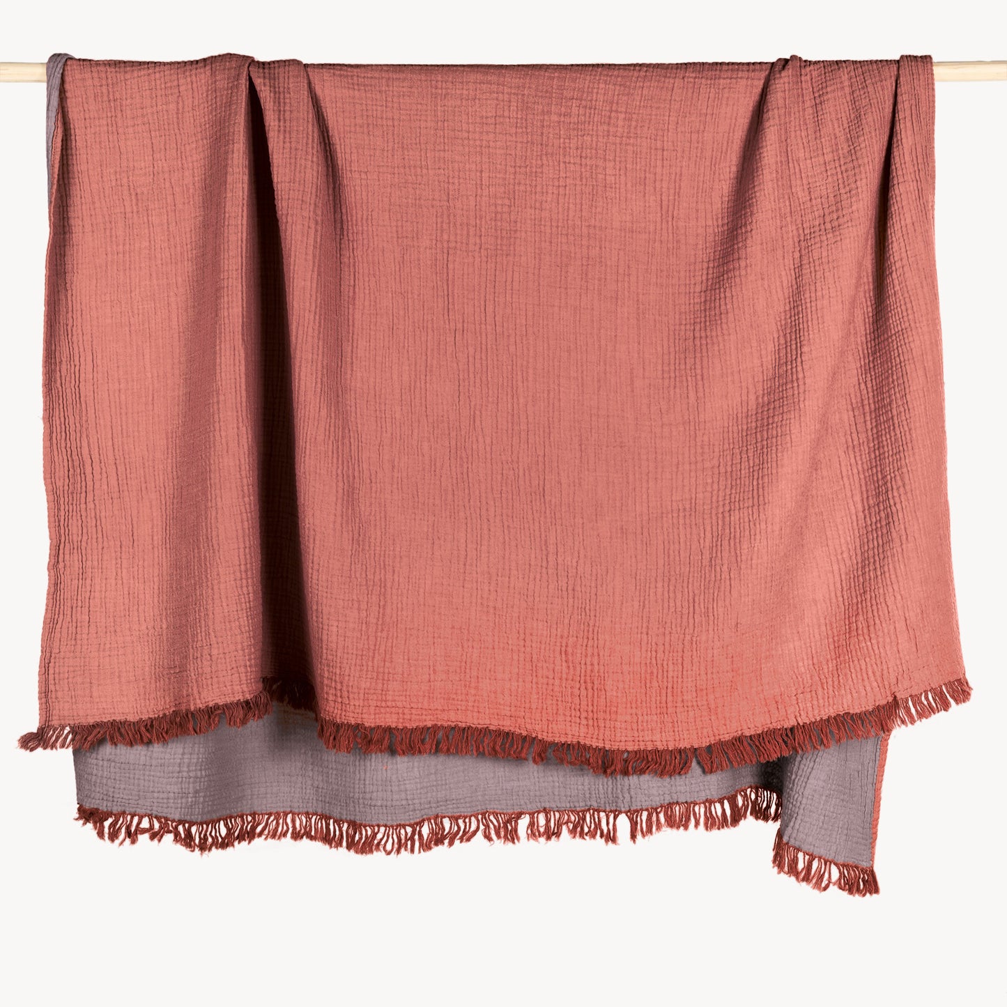 POKOLOKO Solid Crinkle Throw #color_bittersweet-orange-pale-purple