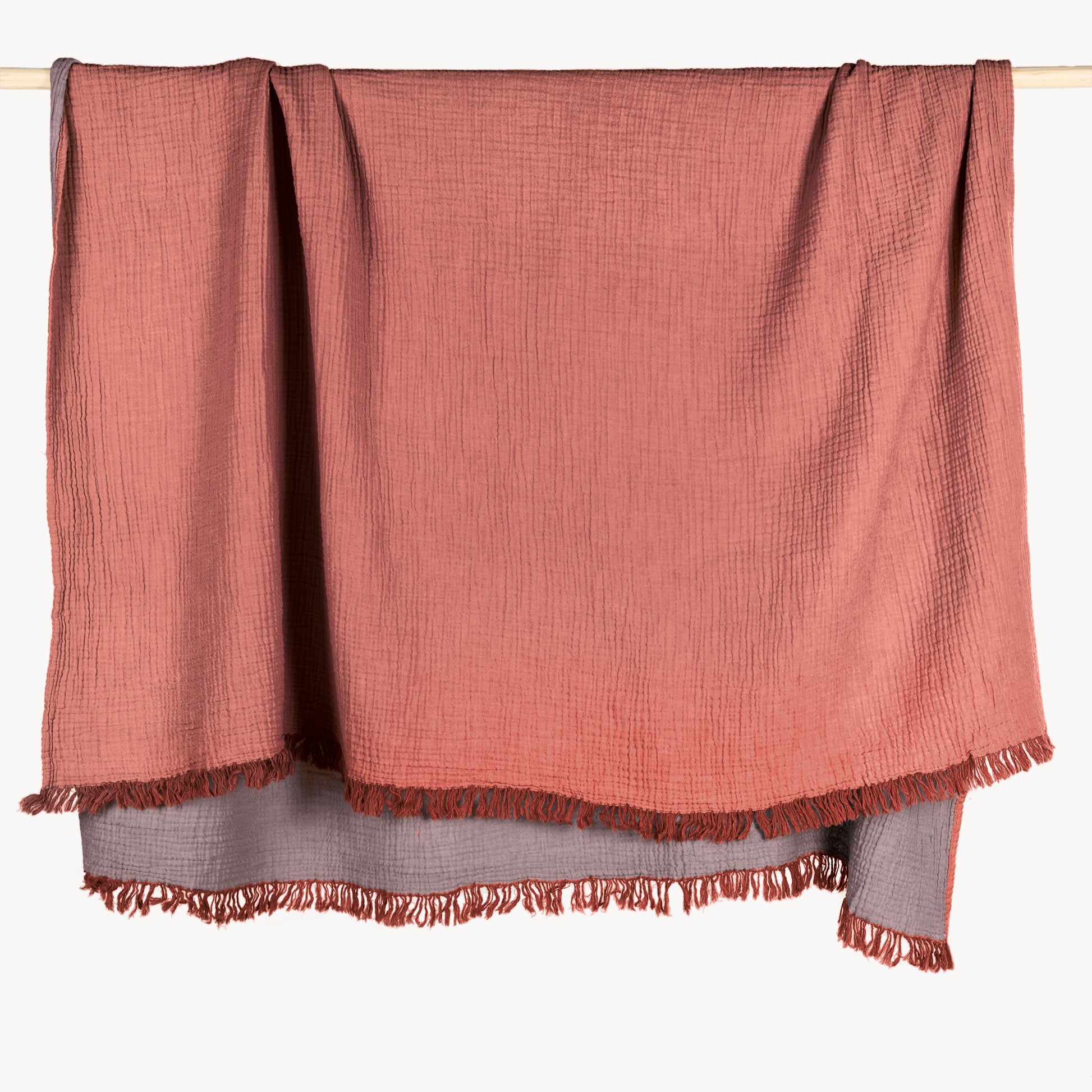 POKOLOKO Solid Crinkle Throw #color_bittersweet-orange-pale-purple